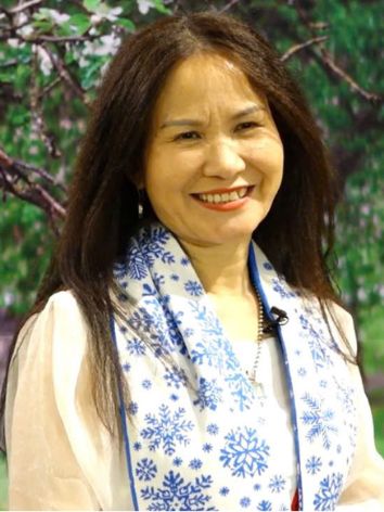 Bà Trần Thị Minh Huệ